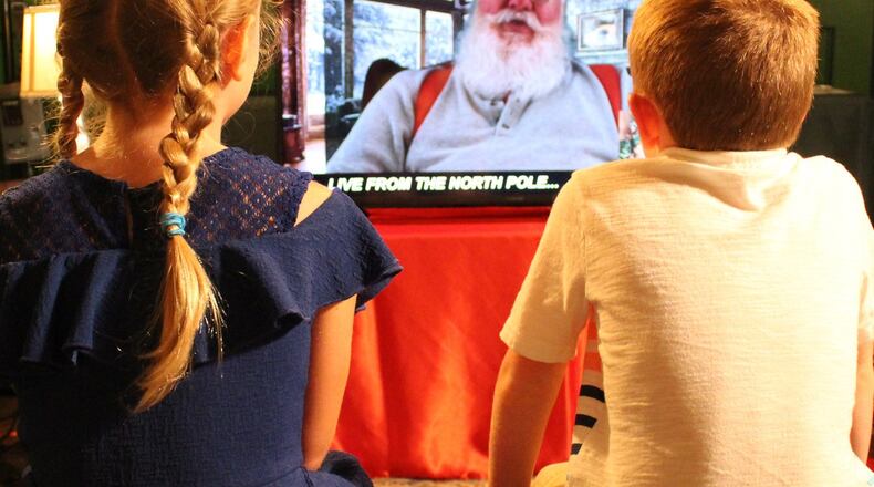 Children chat virtually with Santa from the North Pole during Christmas in July at EnterTRAINment Junction. CONTRIBUTED