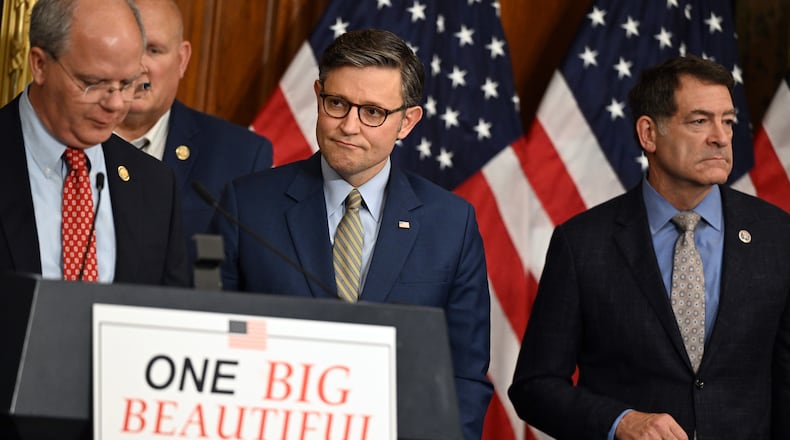 House Speaker Mike Johnson (R-La.), center, during a news conference at the Capitol in Washington on Thursday morning, May 22, 2025, after the House narrowly passed a wide-ranging bill to deliver President Donald Trump’s domestic agenda. The victory for Republicans came after Johnson made concessions to holdouts in several factions and Trump pressured the party to fall in line. (Kenny Holston/The New York Times)