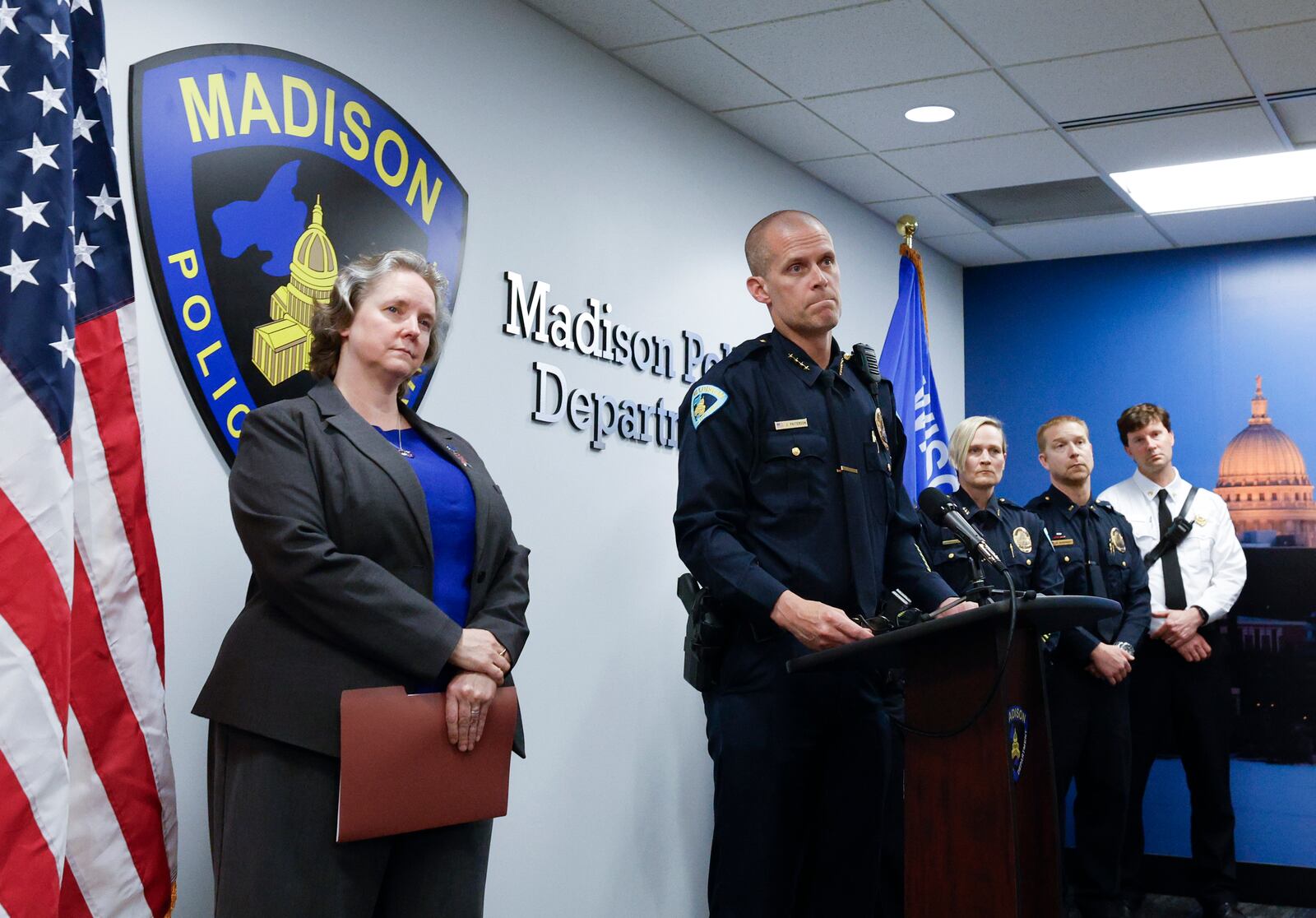 Mayor Satya Rhodes-Conway, left, and Acting Police Chief John Patterson appear during a press conference to announce the arrest of Jeffrey Rupnow in Madison, Wis. Thursday, May 8, 2025. (John Hart/Wisconsin State Journal via AP)