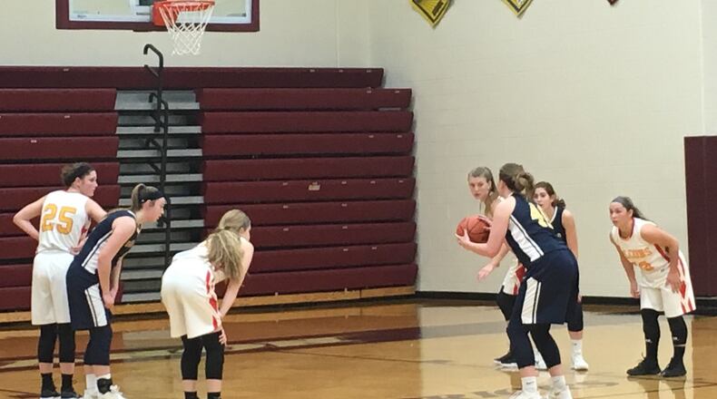 Oakwood’s Kyndall Ketterer (40) prepares to put up a free throw during Saturday’s Division II sectional game against Fenwick at Lebanon. RICK CASSANO/STAFF