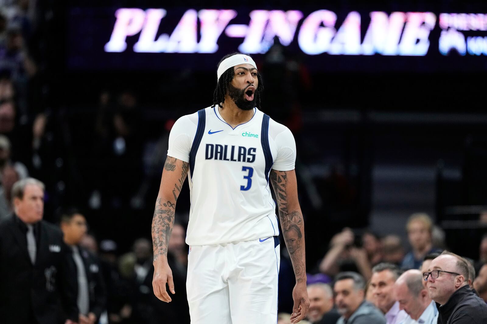 Dallas Mavericks forward Anthony Davis (3) reacts during the first half of an NBA play-in tournament basketball game against the Sacramento Kings, Wednesday, April 16, 2025, in Sacramento, Calif. (AP Photo/Godofredo A. Vásquez)