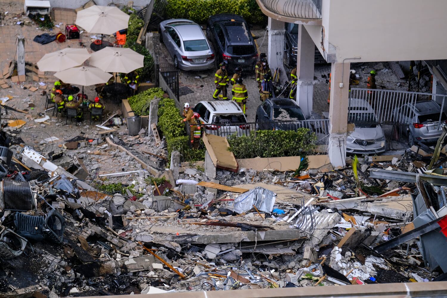 Safety personnel at the scene of a high-rise residential building that partially collapsed in Surfside, Fla., Thursday, June 24, 2021. (Maria Alejandra Cardona/The New York Times)