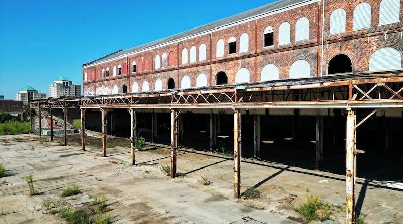 Hamilton will be the first host of the Heritage Ohio's Preservation Assessment Workshop series. The city has a wealth of historic sites and buildings, such as the former Becket Paper mill site (pictured) owned by the city of Hamilton, and this workshop will inform building owners about addressing common issues plagueing old and historic buildings. NICK GRAHAM/STAFF