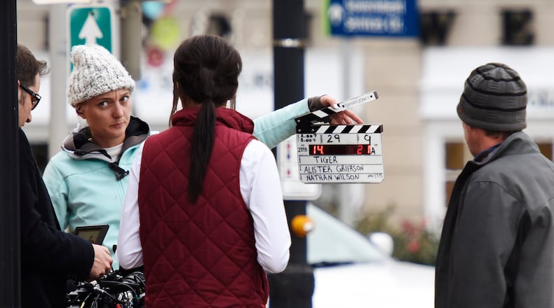 Crews work in 2015 on the set outside the former Hamilton Municipal Building for the movie “Tiger.” NICK GRAHAM/STAFF