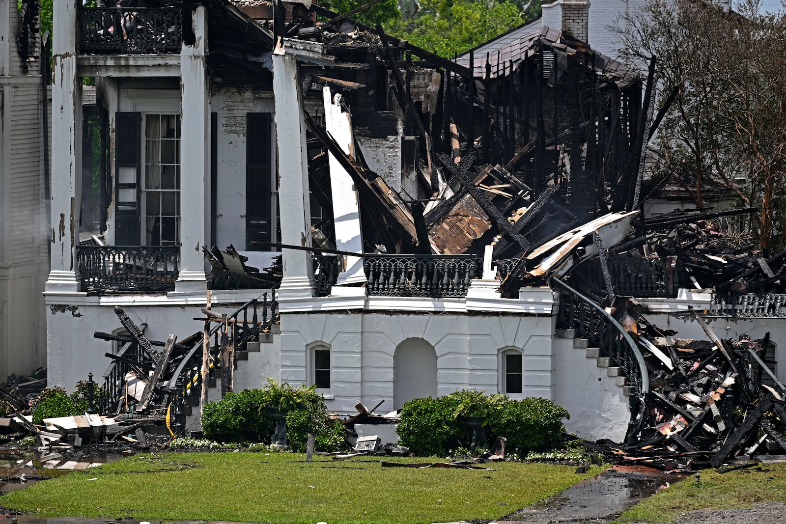 Crews remain on scene after a fire on Thursday, engulfed the historic Nottoway Plantation, Friday, May 16, 2025, in White Castle, La. (Hilary Scheinuk/The Advocate via AP)