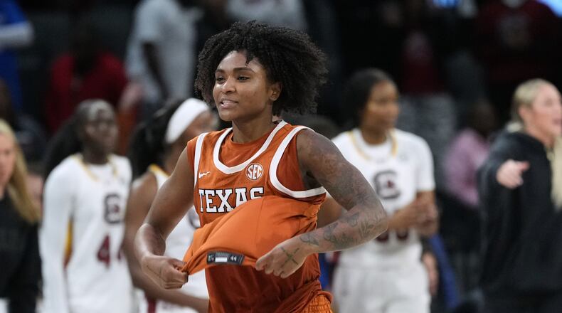 Texas guard Rori Harmon (3) celebrates the team's win over South Carolina in an NCAA college basketball game in the Players Era tournament in Las Vegas, Thursday, Nov. 27, 2025. (AP Photo/Eric Gay)