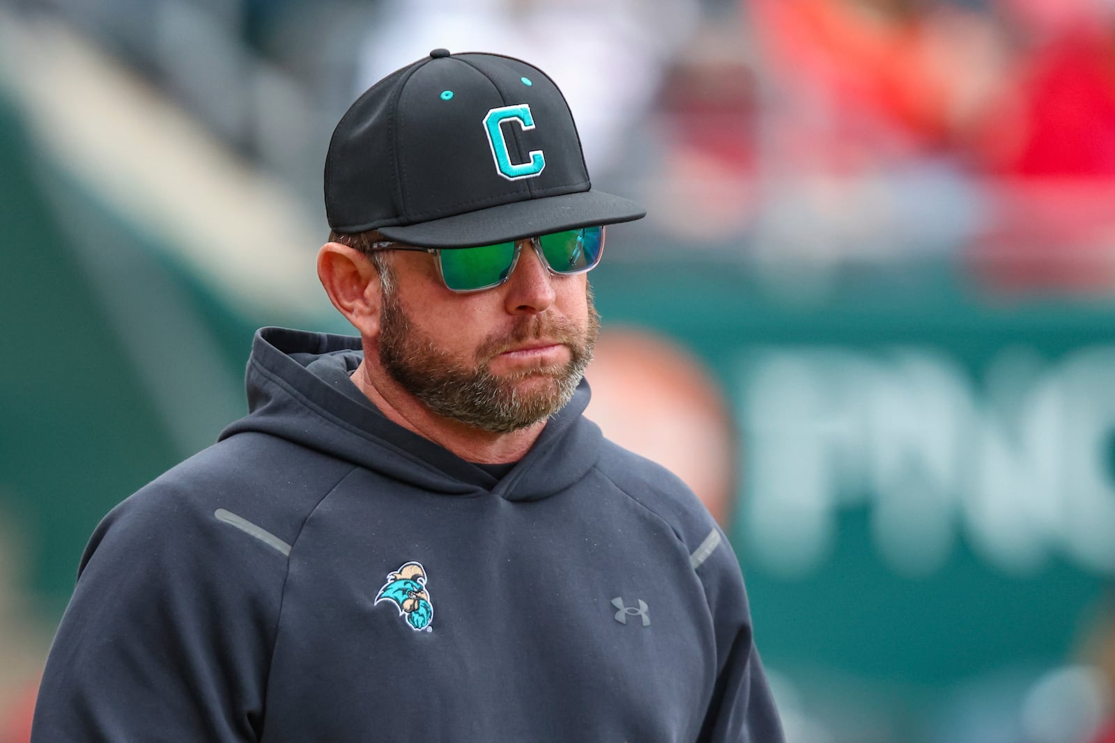 FILE - Coastal Carolina head coach Kevin Schnall walks onto the field during an NCAA baseball game against Ohio State in Jacksonville, Fla., Feb. 22, 2025. (AP Photo/Gary McCullough, file)