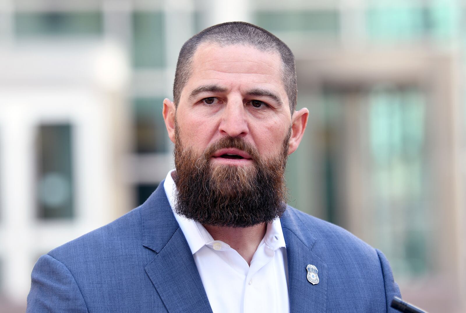 Steve Cagen, special agent in charge of Homeland Security Investigations, speaks to the media following the torture conviction of former Gambian military member Michael Sang Correa in federal court in Denver on Tuesday, April 15, 2025. (AP Photo/Thomas Peipert)