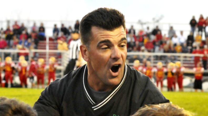 Badin coach Bill Tenore encourages his players during their 27-9 loss on Sept. 30 at Fenwick’s Krusling Field. CONTRIBUTED PHOTO BY DAVID A. MOODIE