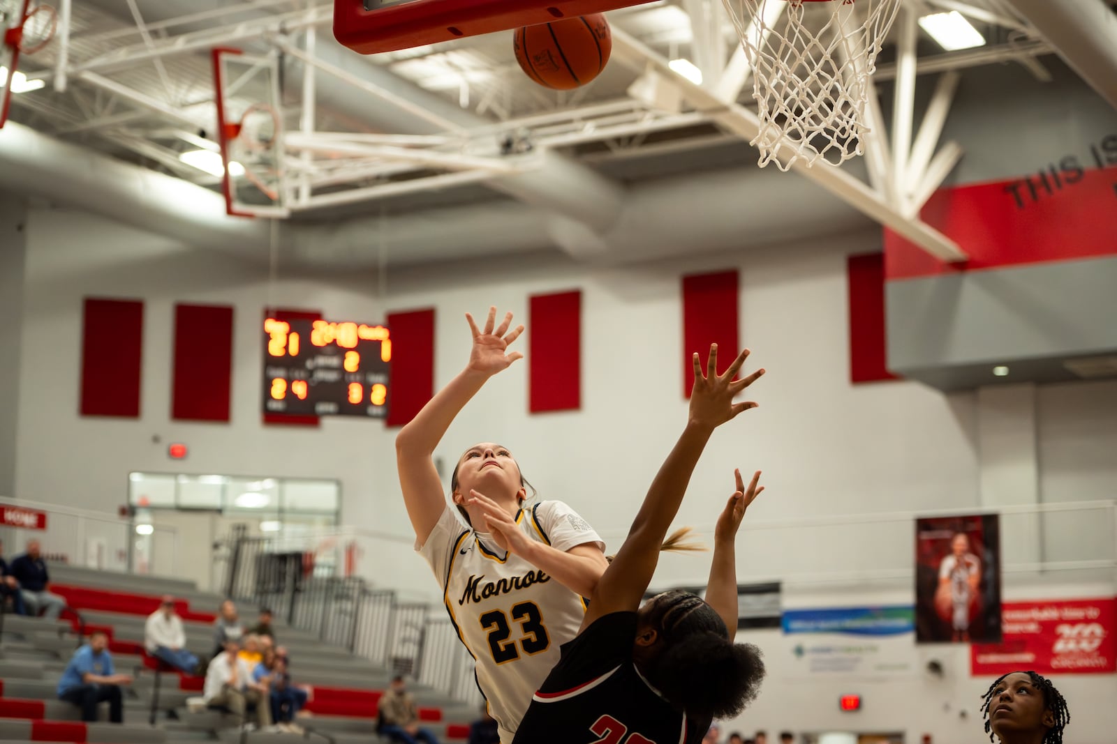 Monroe’s Jordan McComas puts up a shot during her Division III tournament game against Mount Healthy on Thursday night at Princeton. AJ FULLAM / CONTRIBUTED