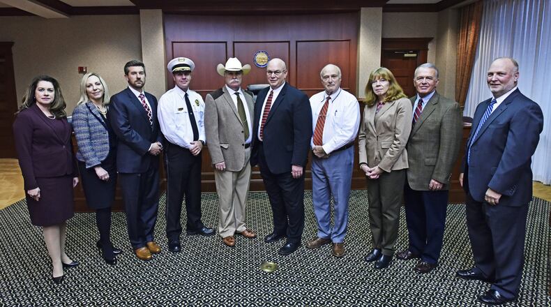 Pictured (from left) are: Butler County Common Pleas Court Judge Jennifer McElfresh, Butler County Common Pleas Court Domestic Relations Judge Margot Halcomb, Butler County Common Pleas Court Judge Michael Oster Jr., Hamilton Police Chief Craig Bucheit, Butler County Sheriff Richard K. Jones, Butler County Common Pleas Court Judge Keith Spaeth, Butler County Prosecutor Mike Gmoser, Butler County Common Pleas Court Domestic Relations Judge Barbara Schneider Carter, Ohio 12th District Court of Appeals Judge Stephen Powell and Butler County Common Pleas Court Judge Greg Howard. All are against Ohio Issue 1 that will be on the Nov. 6 ballot.