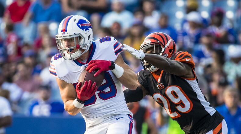 ORCHARD PARK, NY - AUGUST 26: Brandon Reilly #89 of the Buffalo Bills makes a first down reception as Tony McRae #29 of the Cincinnati Bengals defends during the fourth quarter of a preseason game at New Era Field on August 26, 2018 in Orchard Park, New York. Cincinnati defeats Buffalo 26-13 in the preseason matchup. (Photo by Brett Carlsen/Getty Images)