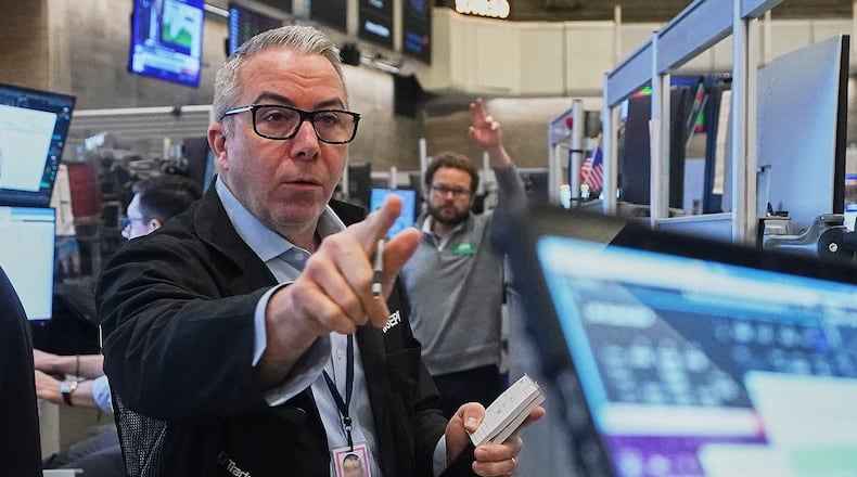 Options trader Joseph D'Arrigo works on the floor of the New York Stock Exchange, Wednesday, Jan. 7, 2026. (AP Photo/Richard Drew)