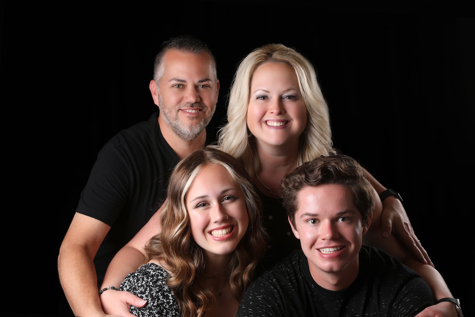 The Shutts family includes Joe and Holly (back row) and daughter Cadynn, 21 and son Carson, 20. CONTRIBUTED
