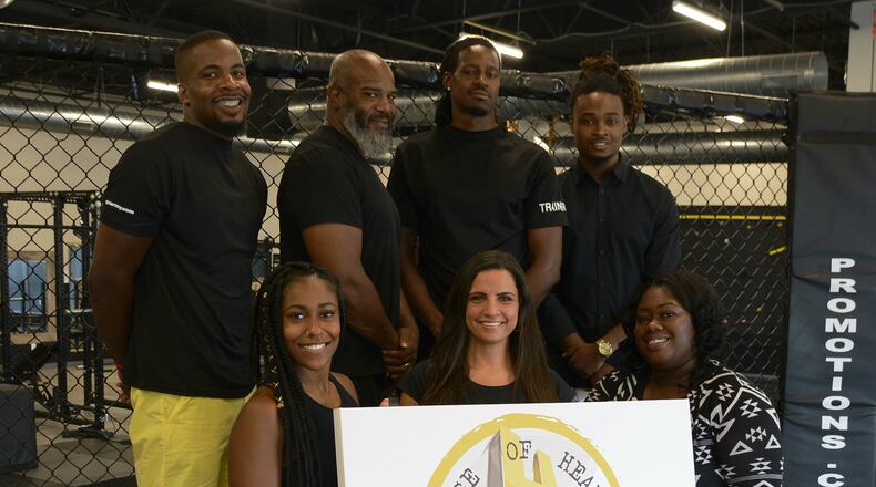The House of Health is a local gym that are inspired by charity and community. Pictured are some of the members of the House of Health team: (back, from left) Mo Abdullah, Tyrome Bembry, Zo Allen, Lonnel Williams; (front, from left) Courtney Tucky, Christina Shteiwi and Chalet Wilkns. Not pictured are A.J. Williams and Carlos Davis. MICHAEL D. PITMAN/STAFF