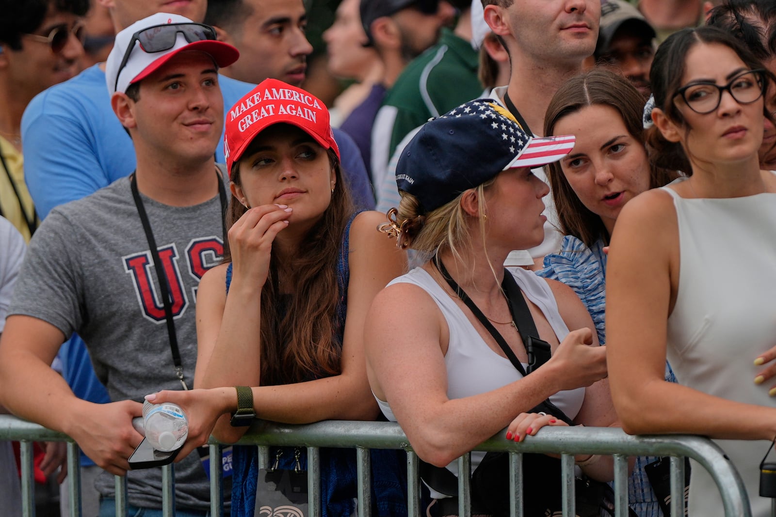 People watch a military parade commemorating the Army's 250th anniversary Saturday, June 14, 2025, in Washington. (AP Photo/Julia Demaree Nikhinson)