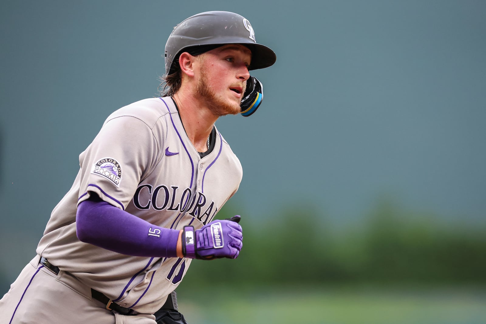 Colorado Rockies' Hunter Goodman rounds third base before scoring a run in the ninth inning of a baseball game against the Atlanta Braves, Saturday, June 14, 2025, in Atlanta. (AP Photo/Colin Hubbard)