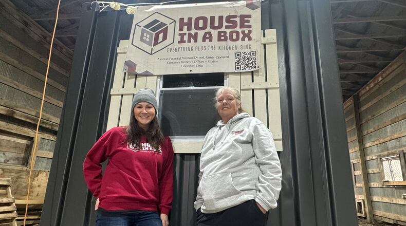 House in a Box is a start-up business selling shipping container homes that can be shipped around the country. They are currently set up in a friend's barn in Fairfield showing their prototype single-wide, called The Jackson. They have several models and floor plans. Pictured are co-owners, niece and aunt Allison Lyons, left, and Sandra Whitley. MICHAEL D. PITMAN