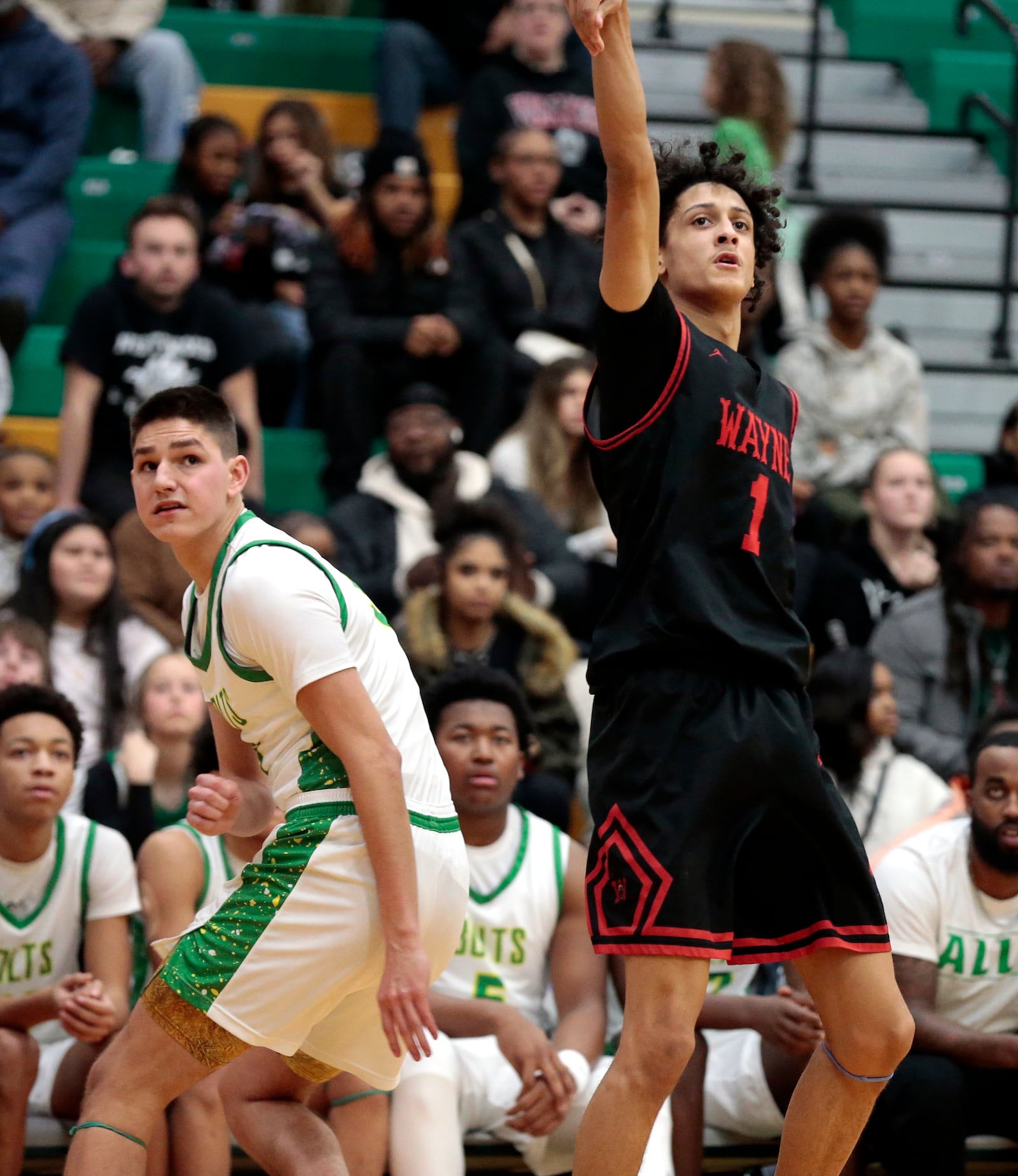 Wayne senior Kaden Post watches a three-point shot attempt. Wayne defeated Northmont 49-40 in a Greater Western Ohio Conference game on Friday, Jan. 10, 2026. STEVEN WRIGHT / STAFF