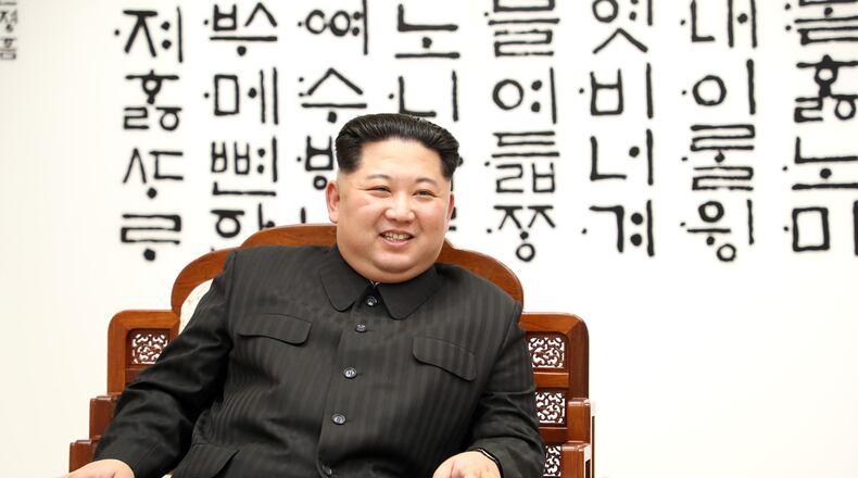 PANMUNJOM, SOUTH KOREA - APRIL 27: North Korean leader Kim Jong Un (R) and South Korean President Moon Jae-in (L) are in talks during the Inter-Korean Summit on April 27, 2018 in Panmunjom, South Korea. Kim and Moon meet at the border today for the third-ever Inter-Korean summit talks after the 1945 division of the peninsula, and first since 2007 between then President Roh Moo-hyun of South Korea and Leader Kim Jong-il of North Korea. (Photo by Korea Summit Press Pool/Getty Images)