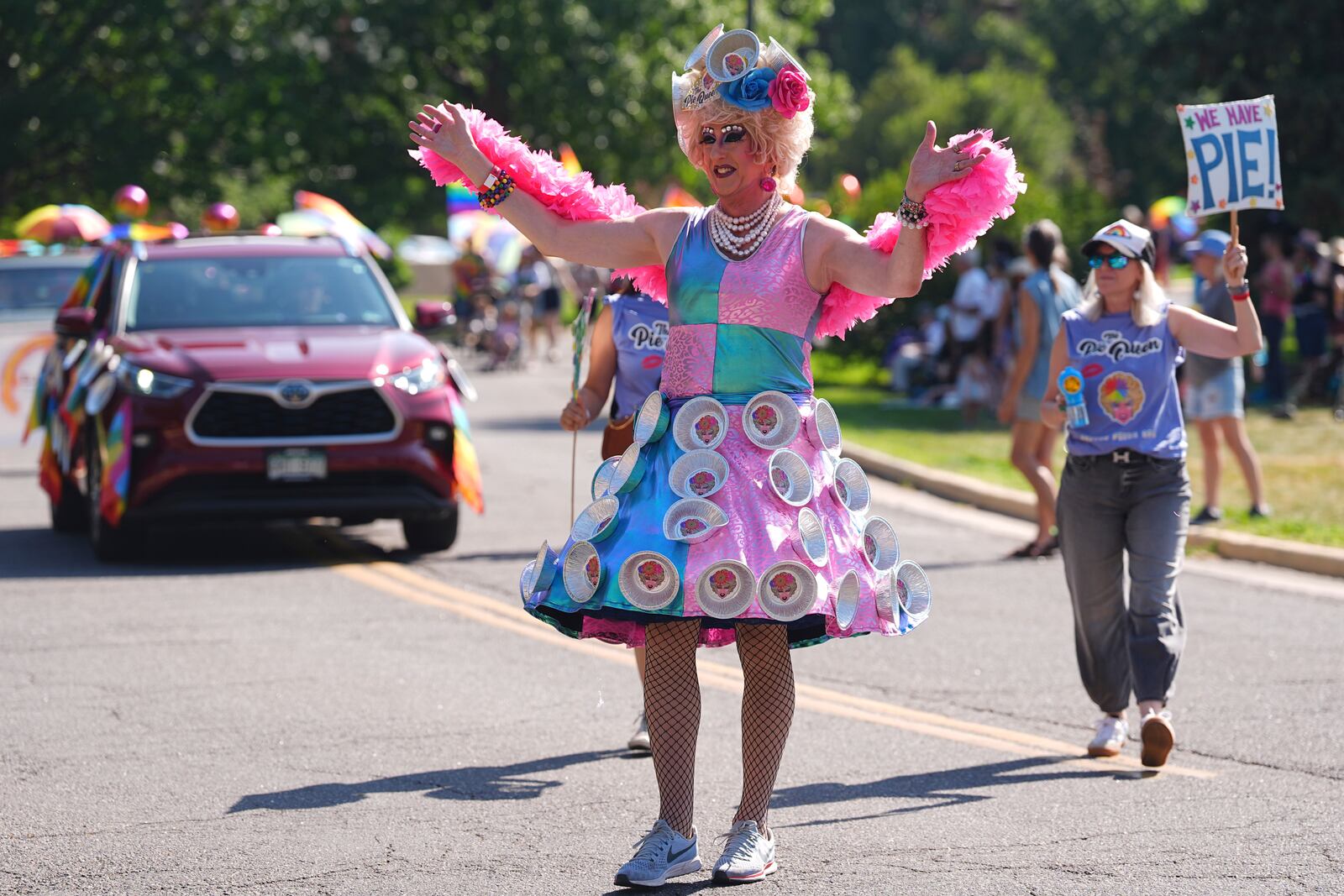 "The Pie Queen" takes part in a parade to celebrate pride month Sunday, June 29, 2025, in Denver. (AP Photo/David Zalubowski)