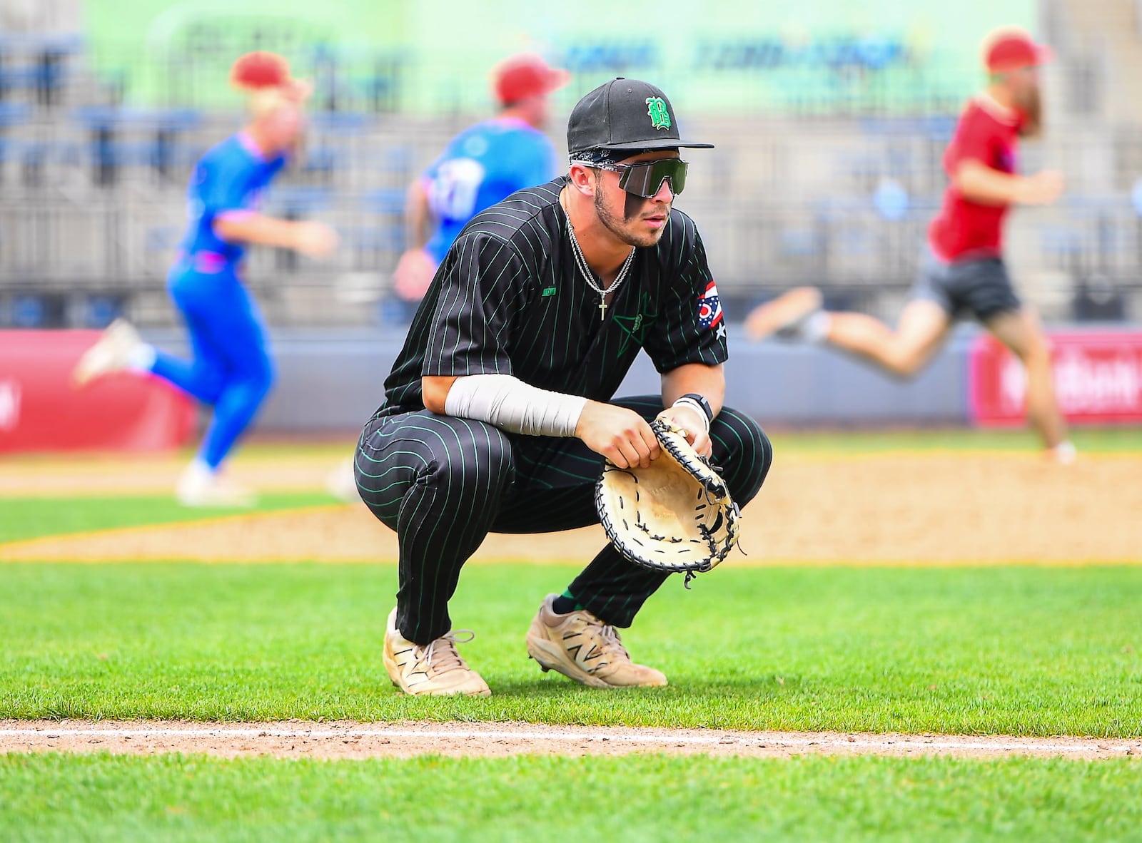 Badin High School's Kade Bowling reacts after the Rams lost to Licking Valley 2-1 in the Division III state semifinals on Friday at Canal Park in Akron. KYLE HENDRIX / CONTRIBUTED