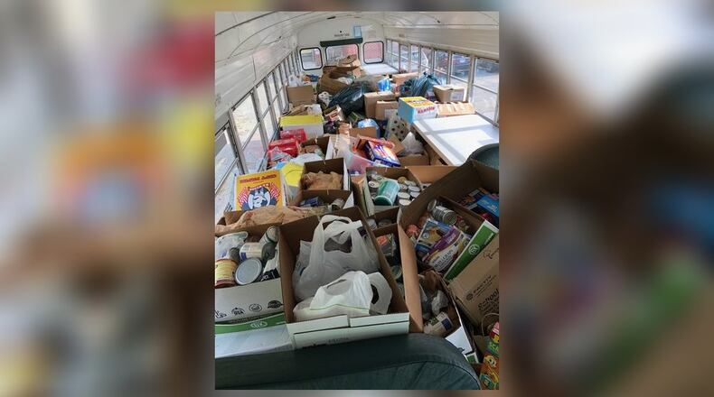 Year after year, Lakota s annual Stuff the Bus food drive continues to yield record results. Up from 27,000 pounds the year prior, last year s grand total reached 35,000 pounds of canned goods and other non-perishable items, enough to stuff four school buses and stock Reach Out Lakota s shelves through the winter months. This year’s competition includes Middletown and Hamilton schools.(Provided Photo/Journal-News)
