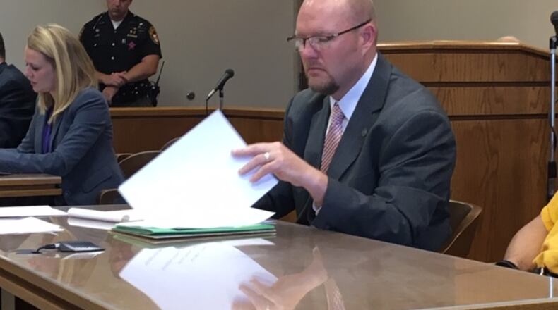 A 17-year-old teen charged with murder and other felonies in the shooting death of Michael Stewart II appeared in Butler County Juvenile Court today with his attorney Jeremy Evans for a pre-trial hearing. LAUREN PACK/STAFF