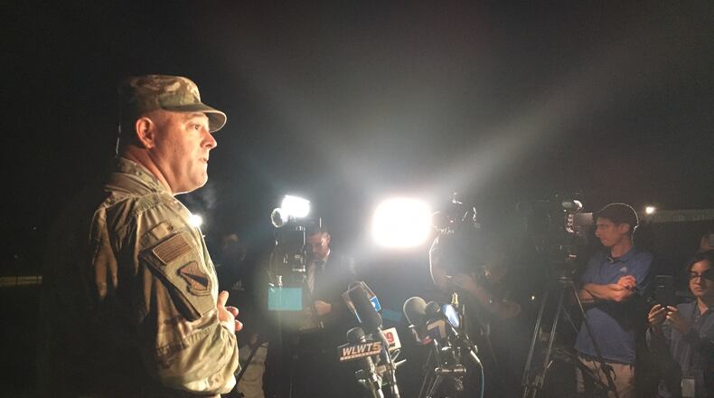 Col. Patrick MIller, commander of the 88th Air Base Wing at Wright-Patterson Air Force Base, addresses the media in a 2 a.m. press conference outside the Hope Hotel. A four-hour investigation found no active shooter on the base after an initial report. THOMAS GNAU/STAFF