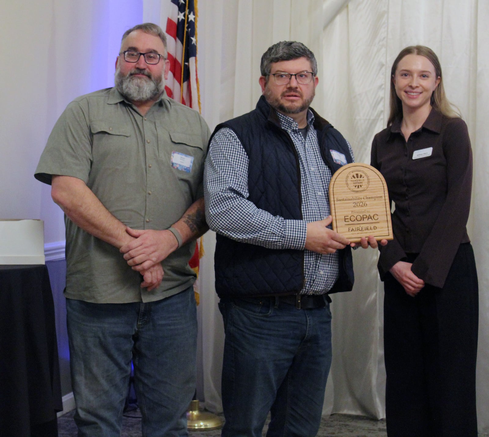 Fairfield's inaugural Sustainability Champion Award was presented by Gillian Hart, to Eco Pack, represented by Bruce Beckman, left, and Jeremy Nagale. SUE KIESEWETTER/CONTRIBUTED