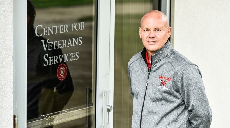J.P. Smith, Regional Coordinator of Veterans Services for Miami Regionals, stands in front of the Center for Veterans Services on the Miami University Middletown Campus Wednesday, April 25 in Middletown. Miami University Regionals was awarded a federal grant from the National Endowment for the Humanities to facilitate its 2018-2019 project “From War Zone to Home: A Humanities Dialogue.” NICK GRAHAM/STAFF