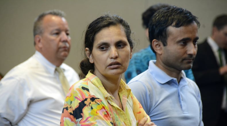 Subha Katel, 43, of Fairfield, is charged with negligent homicide in the alleged shooting death of her husband, Tika Katel, 57, at their Sigmon Way home. Police say Tika was accidentally shot on Saturday afternoon, Aug. 10, 2019, and died on Monday, Aug. 12, 2019. Pictured is Subha Katel on Tuesday afternoon, Aug. 13, 2019, in Fairfield Municipal Court with an interpreter beside her. MICHAEL D. PITMAN/STAFF