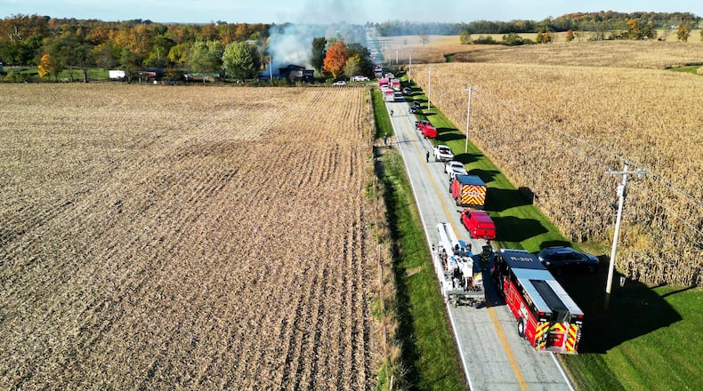 Fire crews from multiple departments in Butler and Preble counties responded to a house fire on Waynes Trace Road in Preble County Tuesday, Oct. 22, 2024. NICK GRAHAM/STAFF