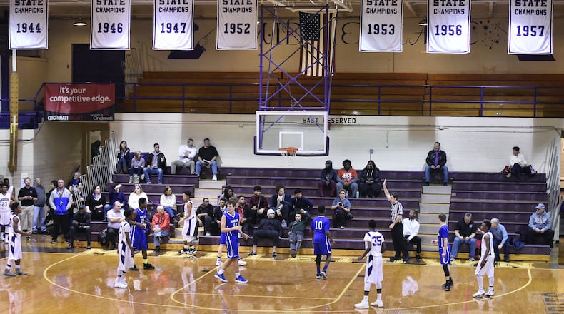 Two Middletown High School boys basketball teams that won back-to-back state championships will be inducted in the Ohio Basketball Hall of Fame next year. The 1951-52 and 1952-53 Middletown High School teams will be inducted in May 2019 in Columbus. The banners for the state championship teams hang over the final game played last December inside Wade E. Miller Gymnasium. NICK GRAHAM/STAFF