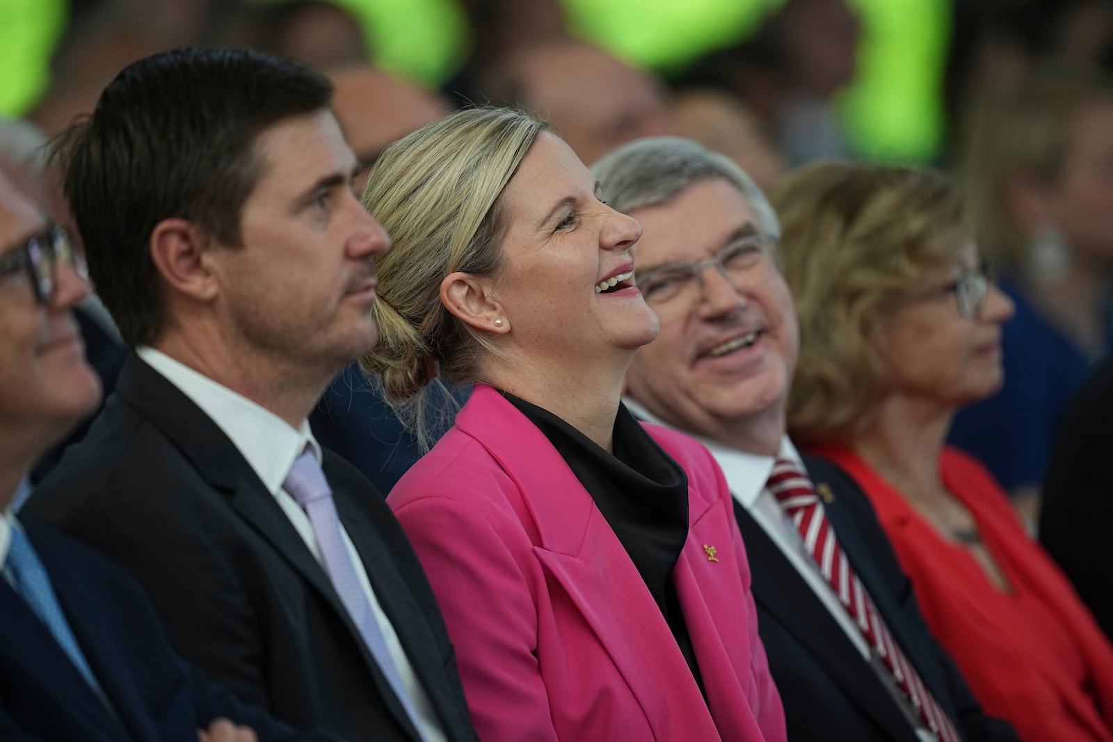 President-elect Kirsty Coventry, center, attends the handover ceremony of the IOC Presidency at Olympic House in Lausanne, Switzerland, Monday, June 23, 2025. (AP Photo/Laurent Cipriani)