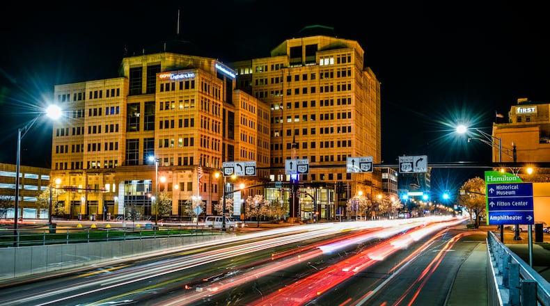The coronavirus pandemic has been the biggest story globally for most of 2020 but Butler County was able to get business accomplished regardless of the challenges. NICK GRAHAM/STAFF
Light trails from passing motorists light up High Street with the Butler County Government Services Center in the background during this 30-second exposure Friday night, April 15 in Hamilton. NICK GRAHAM/STAFF