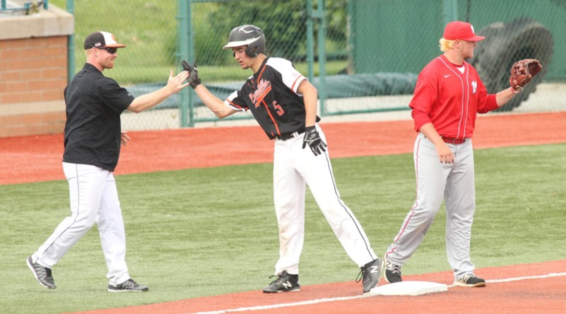PHOTOS: Madison Vs. Versailles Division III Regional High School Baseball