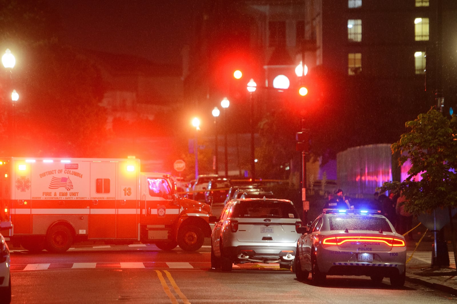 Law enforcement work the scene after two staff members of the Israeli Embassy in Washington were shot and killed outside the Capital Jewish Museum, Thursday, May 22, 2025, in Washington. (AP Photo/Rod Lamkey, Jr.)