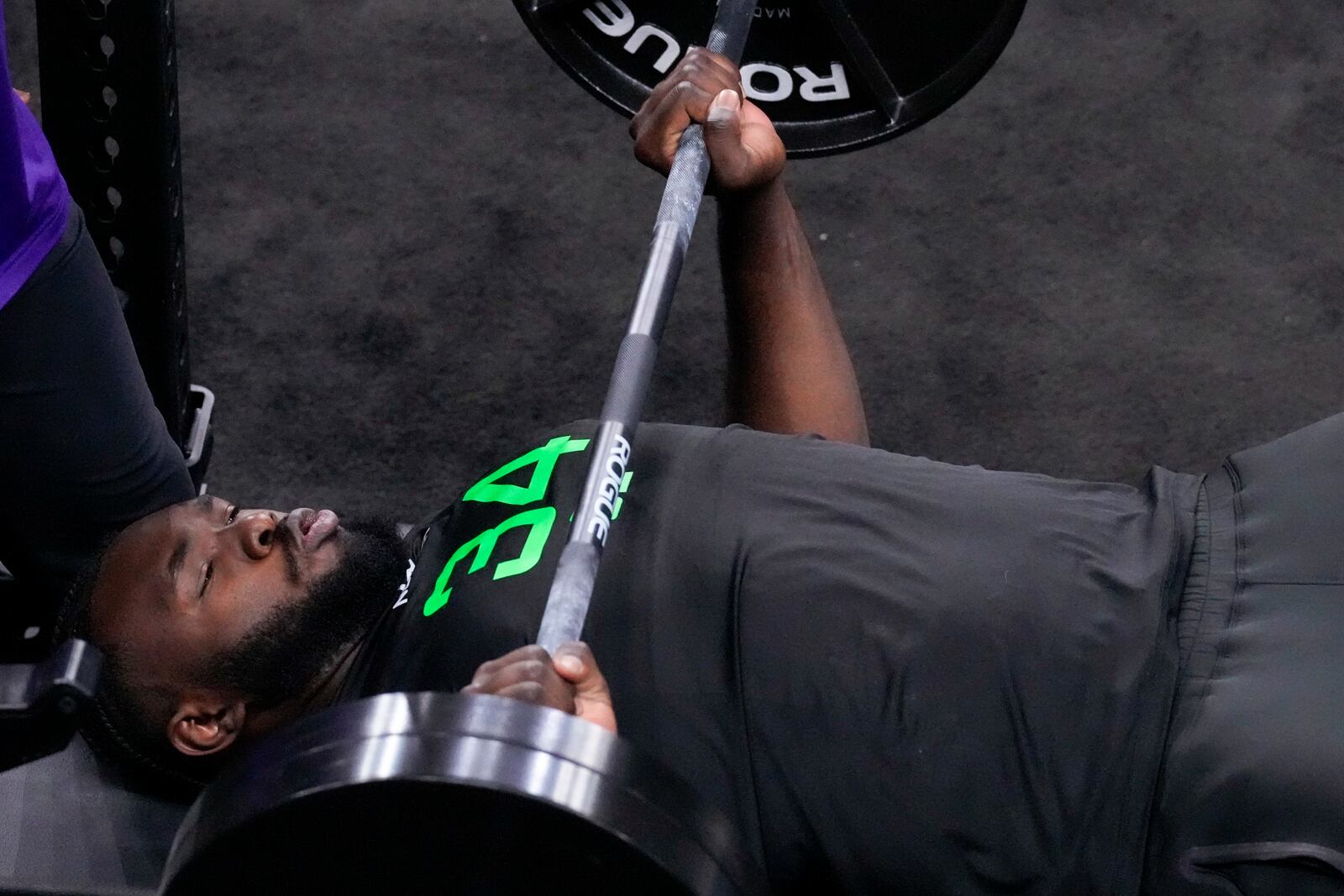 Miami offensive lineman Jalen Rivers lifts weights at the NFL football scouting combine Monday, March 3, 2025, in Indianapolis. The Bengals drafted Rivers in the fifth round. (AP Photo/George Walker IV)