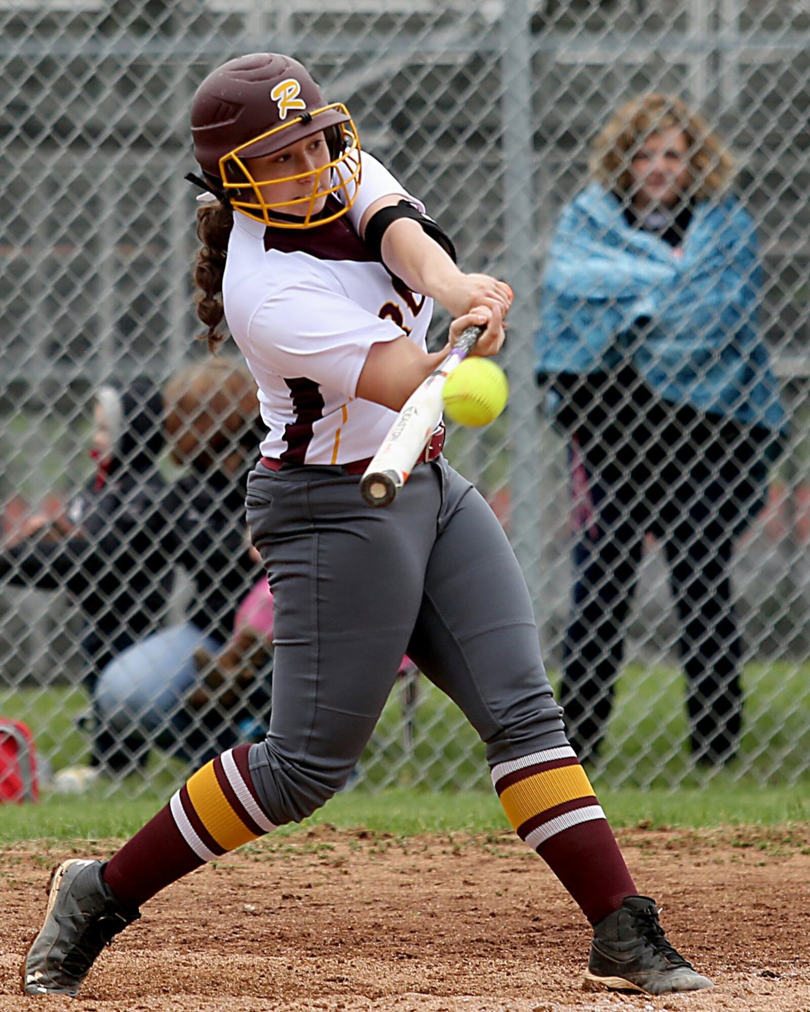 Ross catcher Ally Ivey connects for a single during Saturday’s game against visiting Madison. CONTRIBUTED PHOTO BY E.L. HUBBARD