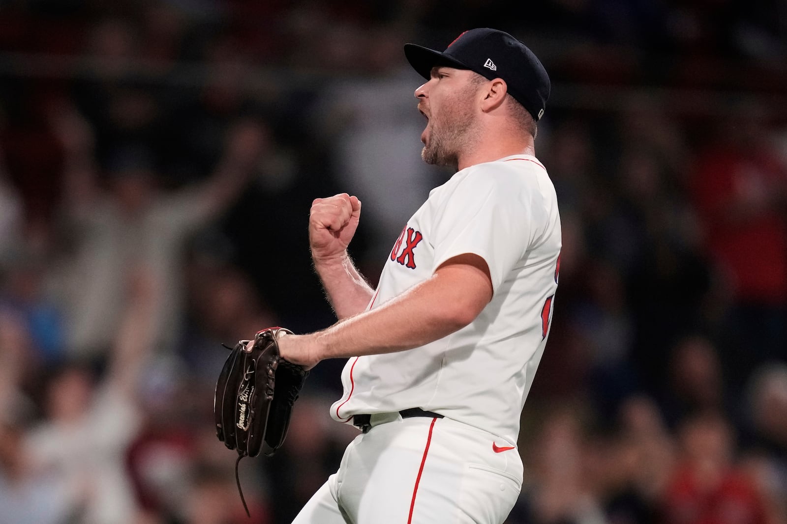Boston Red Sox pitcher Liam Hendriks celebrates after the final out of a baseball game against the Minnesota Twins at Fenway Park, Friday, May 2, 2025, in Boston. (AP Photo/Charles Krupa)