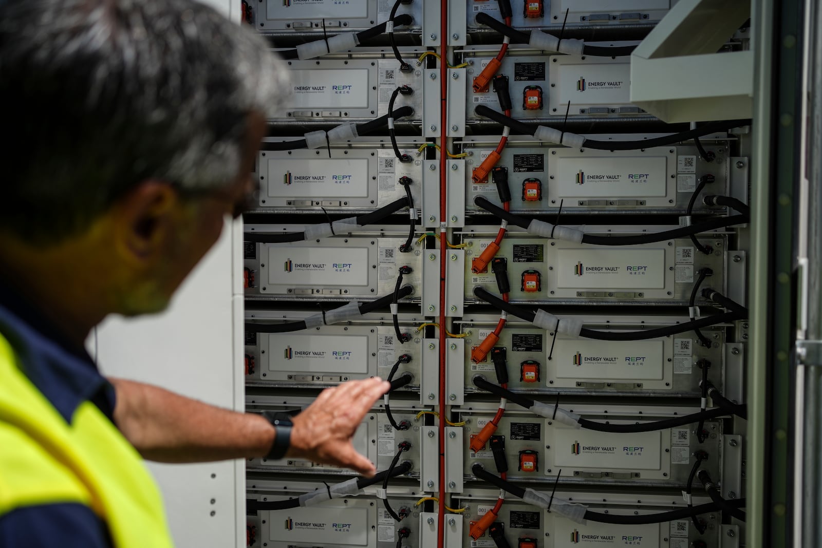 Craig Horne, vice president of advanced energy solutions for Energy Vault, a company that is creating an emergency power system that relies on hydrogen and battery storage, shows a battery system Tuesday, May 27, 2025, in Calistoga, Calif. (AP Photo/Annika Hammerschlag)