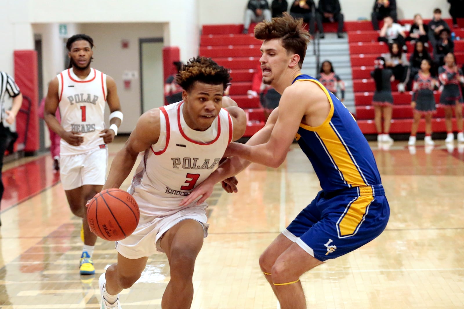 Northridge's Keonte Smith looks to get past Lehman Catholic's Shane Frantz. Northridge defeated Lehman Catholic 86-47 on Friday, Jan. 16, 2026.. STEVEN WRIGHT / STAFF
