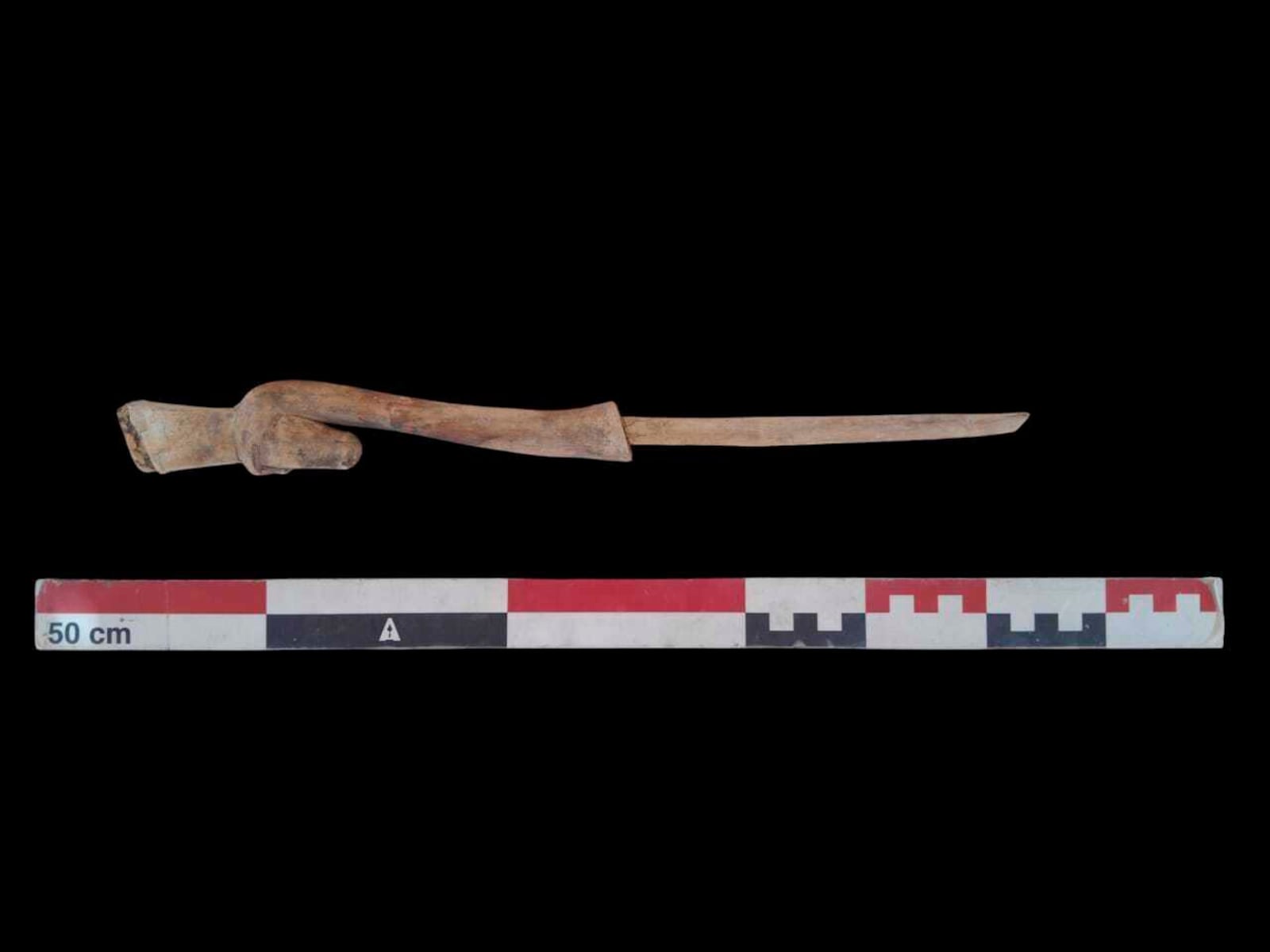 In this undated photo, artifacts are displayed that were found in the three new graves of senior statesmen found in the Dra' Abu al-Naga necropolis area in Luxor, Egypt. (Egypt Ministry of Tourism and Antiquities via AP)