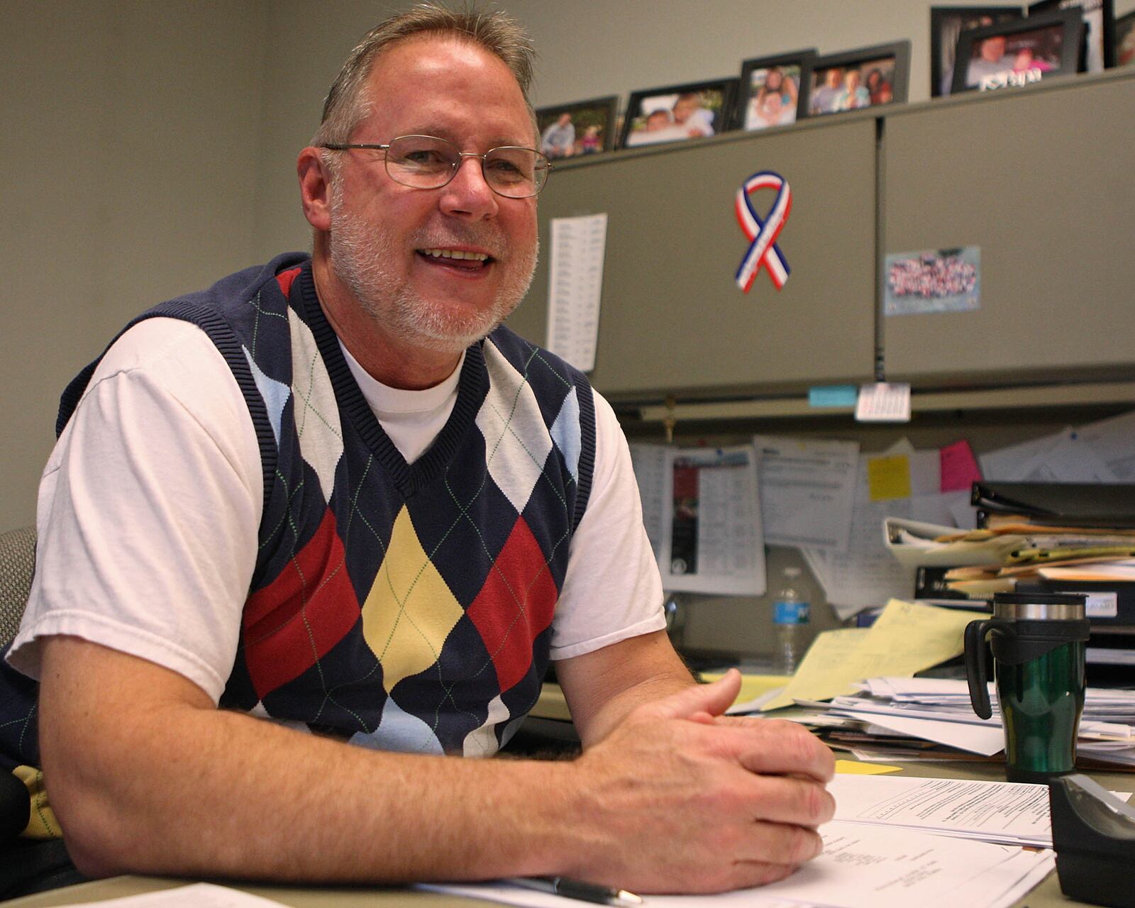 Howard “Sonny” Lewis, at his desk in the city building, will split his time as Franklin’s city manager and Public Works director.