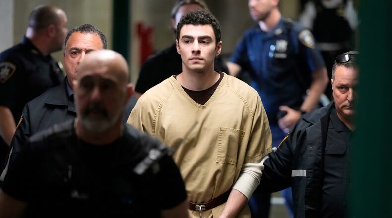 Luigi Mangione is escorted into Manhattan state court in New York, Tuesday, Sept. 16, 2025. (AP Photo/Seth Wenig)