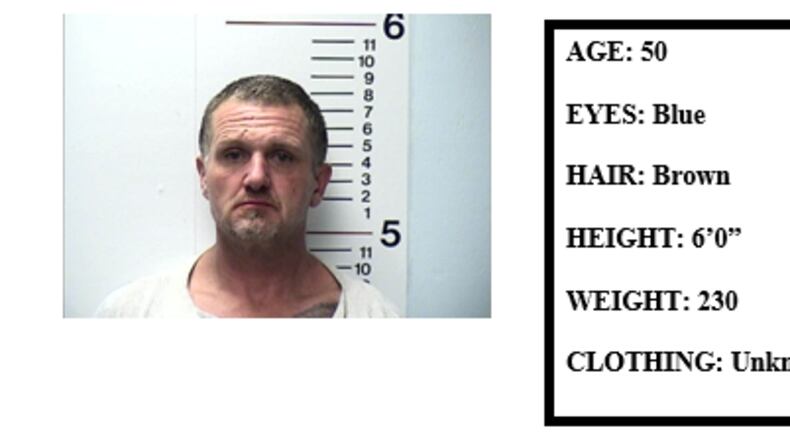 Michael Bowlin Sr., 50, who was also wanted on a burglary charge, was not found at the house.