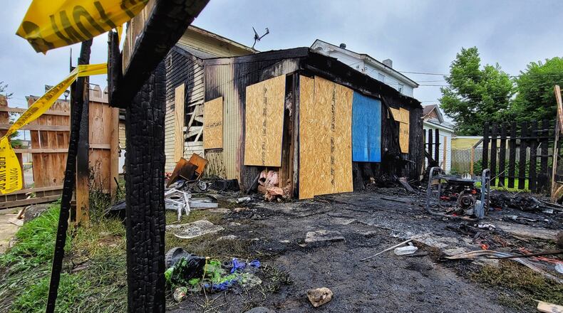 A Ludlow Street house was heavily damaged by fire late Wednesday night in Hamilton. NICK GRAHAM/STAFF