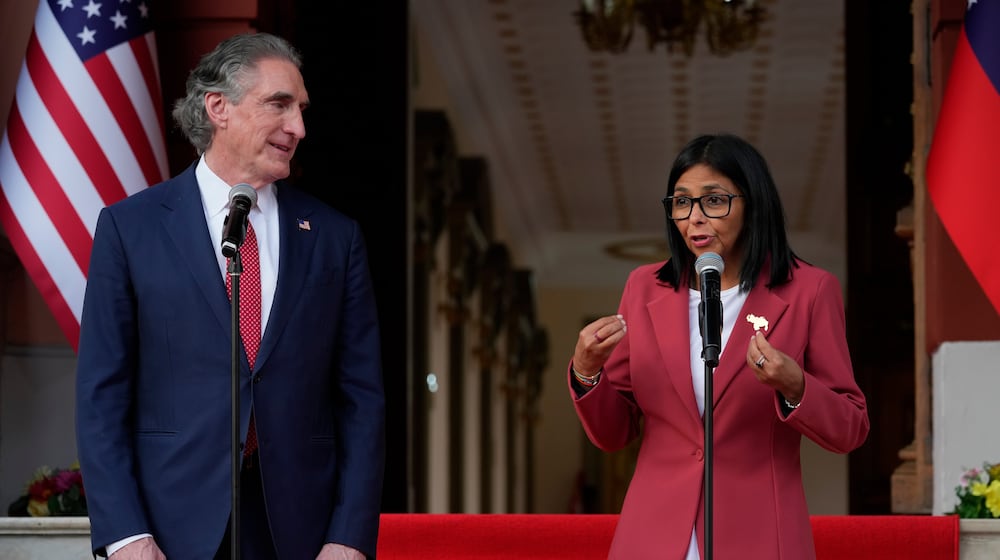 Venezuela's acting President Delcy Rodriguez, right, delivers joint remarks with U.S. Interior Secretary Doug Burgum at Miraflores presidential palace in Caracas, Venezuela, Wednesday, March 4, 2026. (AP Photo/Ariana Cubillos)