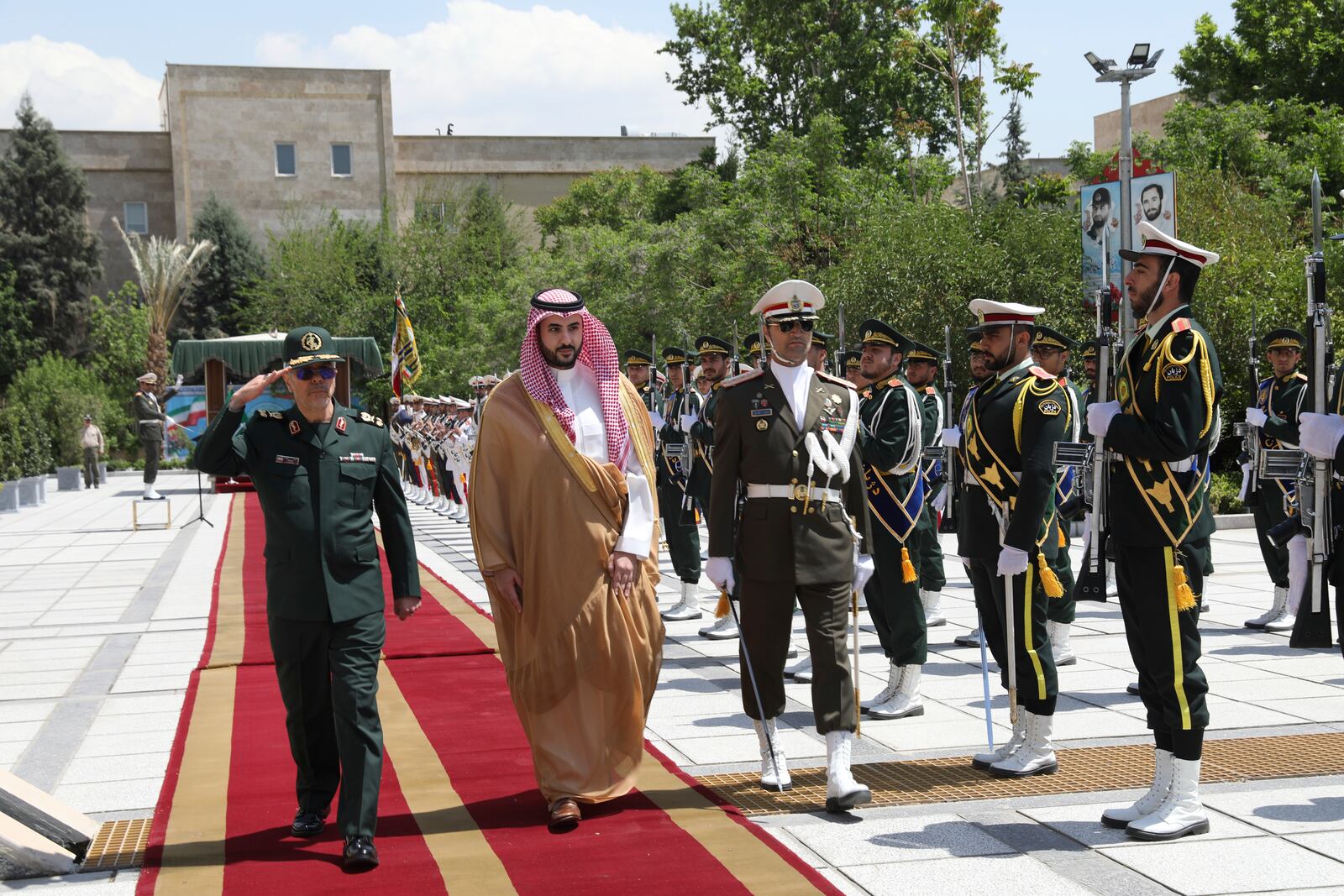 This image released by the public relations of the General Staff of Iran's Armed Forces, Saudi Arabia's Defense Minister Prince Khalid bin Salman, second left, reviews an honor guard as he is accompanied by Chief of the General Staff of Iran's Armed Forces Gen. Mohammad Hossein Bagheri, left, during a welcoming ceremony in Tehran, Thursday, April 17, 2025. ( Public relations of the General Staff of Iran's Armed Forces via AP)